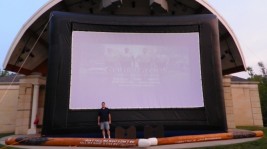How about a little perspective.  It is hard to imagine how large the 25' x 15' screen without being there.  This ia a picture of me @6' 4